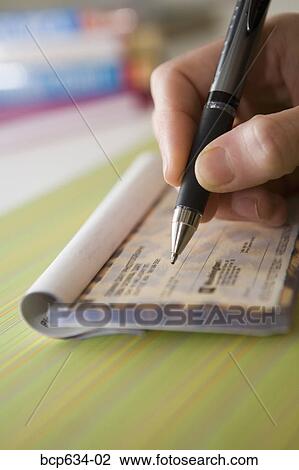 Stock Image - bill, bills, check, checkbook, close up. Fotosearch