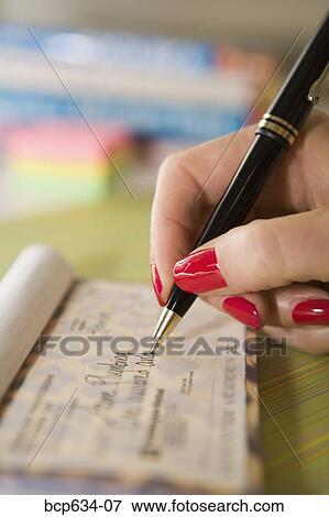 Stock Photo - bill, bills, check, checkbook, close up. Fotosearch