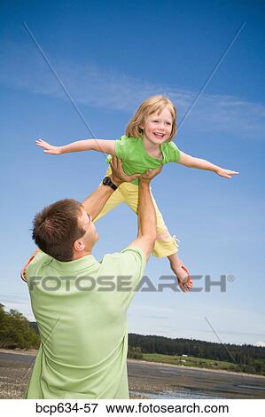 blue sky, daughter, childhood, caucasian, afternoon View Large Photo Image Stock Photo - blue sky, daughter, childhood, caucasian, afternoon. Fotosearch