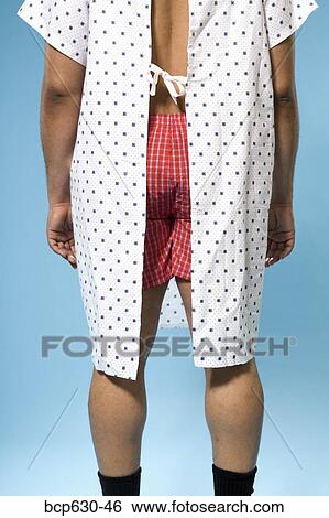 boxer shorts, healthcare, gown, facing away, african ethnicity View Large Photo Image Stock Photograph - boxer shorts, healthcare, gown, facing away, african ethnicity. Fotosearch