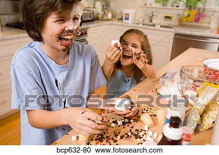 Stock Image - boy, brother, caucasian, childhood, chocolate. Fotosearch