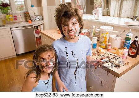 Stock Image - boy, brother, caucasian, childhood, chocolate. Fotosearch