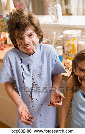 Stock Photograph - boy, brother, caucasian, childhood, chocolate. Fotosearch
