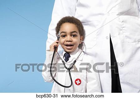 boy, doctor, childhood, caring, african ethnicity View Large Photo Image Stock Image - boy, doctor, childhood, caring, african ethnicity. Fotosearch