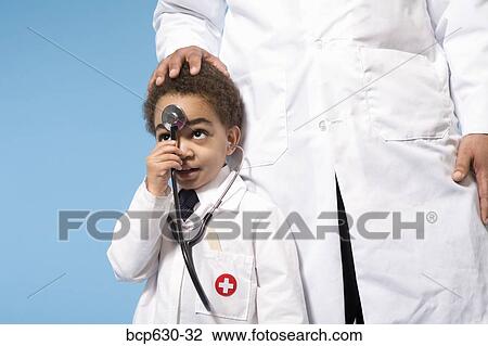 boy, doctor, childhood, caring, african ethnicity View Large Photo Image Stock Image - boy, doctor, childhood, caring, african ethnicity. Fotosearch