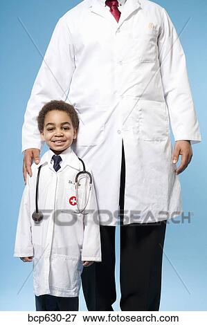 boy, doctor, childhood, caring, african ethnicity View Large Photo Image Stock Photo - boy, doctor, childhood, caring, african ethnicity. Fotosearch