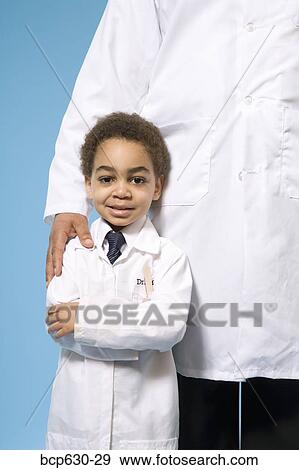 boy, doctor, childhood, caring, african ethnicity View Large Photo Image Stock Photo - boy, doctor, childhood, caring, african ethnicity. Fotosearch