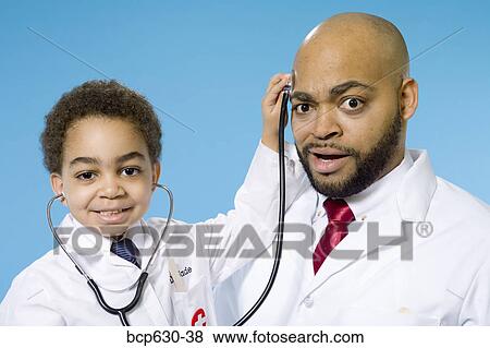boy, doctor, childhood, caring, african ethnicity View Large Photo Image Stock Photo - boy, doctor, childhood, caring, african ethnicity. Fotosearch