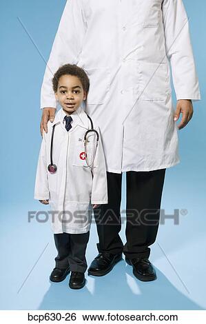 boy, doctor, childhood, caring, african ethnicity View Large Photo Image Stock Photograph - boy, doctor, childhood, caring, african ethnicity. Fotosearch