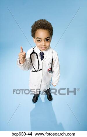 boy, doctor, confidence, childhood, african ethnicity View Large Photo Image Picture - boy, doctor, confidence, childhood, african ethnicity. Fotosearch