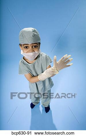 Stock Image - boy, education, doctor, childhood, african ethnicity. Fotosearch