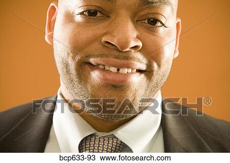 businessman, fortysomething, close up, african ethnicity View Large Photo Image Stock Image - businessman, fortysomething, close up, african ethnicity. Fotosearch