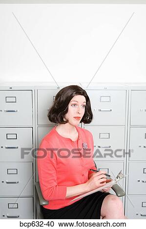 businesswoman, file cabinet, clipboard, caucasian, administrator View Large Photo Image Stock Image - businesswoman, file cabinet, clipboard, caucasian, administrator. Fotosearch