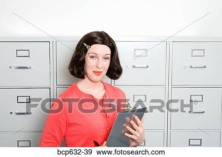 businesswoman, file cabinet, clipboard, caucasian, administrator View Large Photo Image Stock Photo - businesswoman, file cabinet, clipboard, caucasian, administrator. Fotosearch