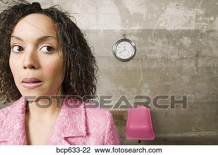 businesswoman, head & shoulders, clock, chair, african ethnicity View Large Photo Image Stock Image - businesswoman, head & shoulders, clock, chair, african ethnicity. Fotosearch