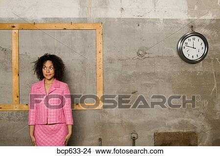 businesswoman, inside, clock, african ethnicity View Large Photo Image Picture - businesswoman, inside, clock, african ethnicity. Fotosearch