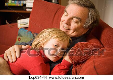 Picture - caring, caucasian, childhood, domestic life, eyes closed. Fotosearch