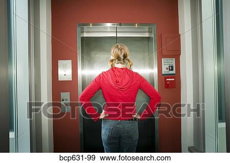 caucasian, elevator, facing away, inside View Large Photo Image Stock Photo - caucasian, elevator, facing away, inside. Fotosearch
