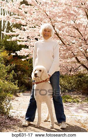 caucasian, fortysomething, dog, day, afternoon View Large Photo Image Stock Photo - caucasian, fortysomething, dog, day, afternoon. Fotosearch