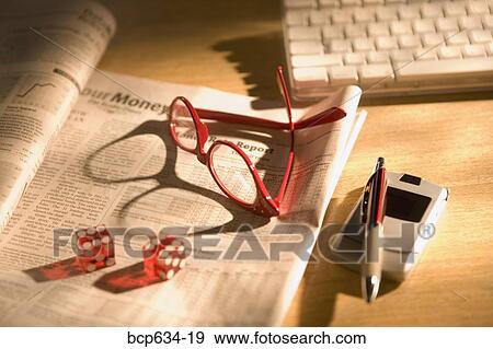 Stock Photo - cell phone, chance, computer, dice, eyeglasses, finance. Fotosearch