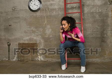 cell phone, full body, clock, african ethnicity View Large Photo Image Stock Image - cell phone, full body, clock, african ethnicity. Fotosearch