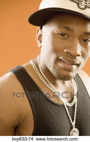chain, head & shoulders, hat, close up, african ethnicity View Large Photo Image Picture - chain, head & shoulders, hat, close up, african ethnicity. Fotosearch