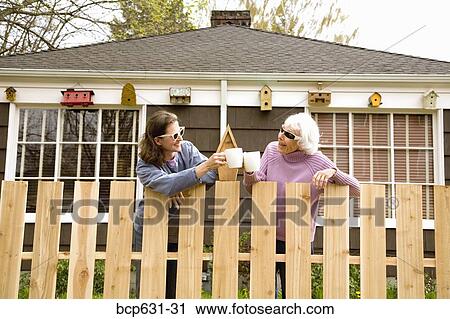 Stock Image - cheers, autumn, celebration, caucasian, birdhouse, afternoon. Fotosearch