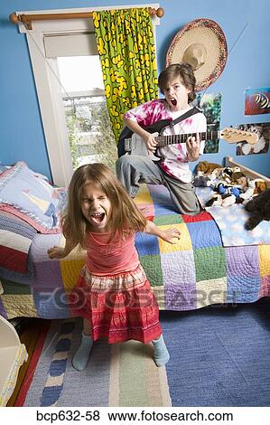 Stock Photo - childhood, bedroom, caucasian, brother, boy, adolescent. Fotosearch