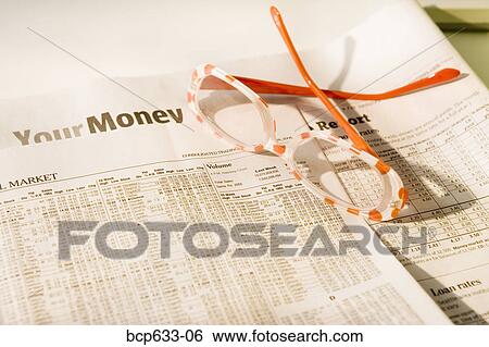 Stock Photograph - close up, eyeglasses, finance, high angle, inside. Fotosearch