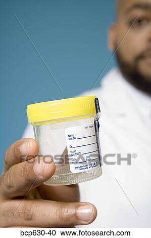 Stock Image - close up, fortysomething, education, doctor, african ethnicity. Fotosearch