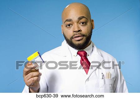 Stock Photo - doctor, fortysomething, education, african ethnicity. Fotosearch