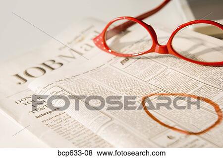 Stock Photo - employment, circle, close up, classifieds, circling, advertisement. Fotosearch