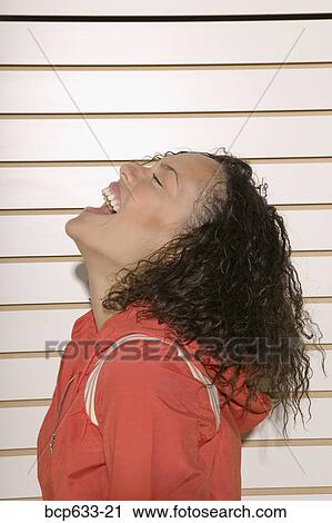 eyes closed, laughing, head & shoulders, african ethnicity View Large Photo Image Stock Image - eyes closed, laughing, head & shoulders, african ethnicity. Fotosearch