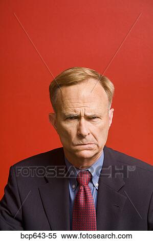 Businessman frowning View Large Photo Image Stock Photography - Businessman frowning. Fotosearch