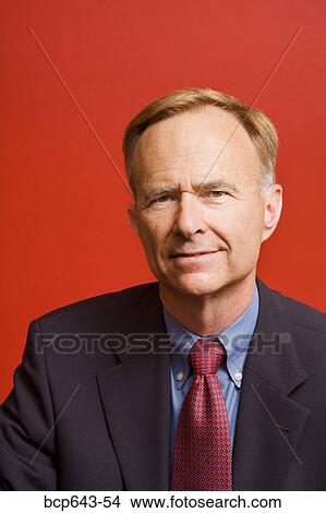 Businessman smiling View Large Photo Image Picture - Businessman smiling. Fotosearch