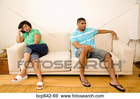 Couple ignoring each other View Large Photo Image Stock Photo - Couple ignoring each other. Fotosearch