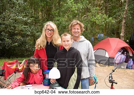 Family smiling at campsite View Large Photo Image Picture - Family smiling at campsite. Fotosearch