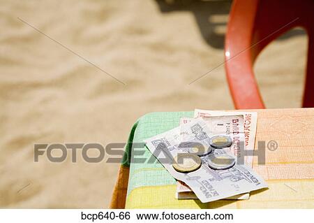 Foreign currency on table View Large Photo Image Stock Photograph - Foreign currency on table. Fotosearch