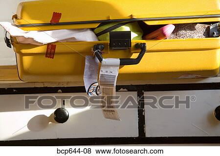 Overstuffed suitcase View Large Photo Image Stock Photo - Overstuffed suitcase. Fotosearch