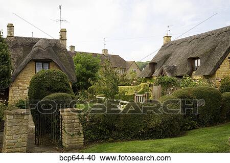 Thatched roof cottages, Gloucestershire, United Kingdom View Large Photo Image Stock Image - Thatched roof cottages, Gloucestershire, United Kingdom. Fotosearch