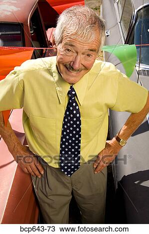 Used car salesman grinning View Large Photo Image Stock Image - Used car salesman grinning. Fotosearch