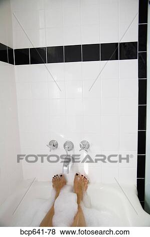 Woman’s feet in bathtub View Large Photo Image Stock Photo - Woman’s feet in bathtub. Fotosearch