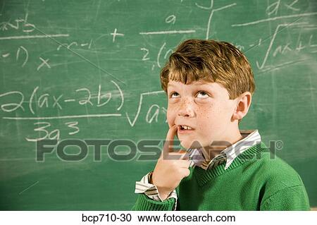 Boy thinking in front of math on blackboard View Large Photo Image Stock Image - Boy thinking in front of math on blackboard. Fotosearch