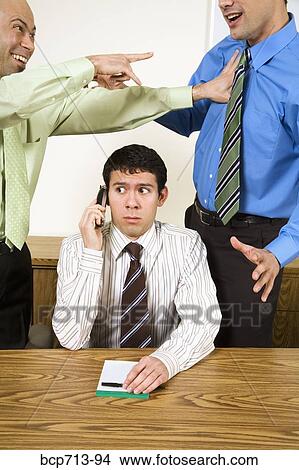 Picture - Businessman talking on telephone. Fotosearch