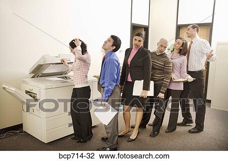 Businesspeople on line to use photocopy machine View Large Photo Image Stock Image - Businesspeople on line to use photocopy machine. Fotosearch