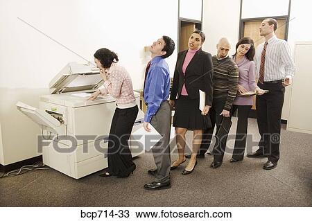 Businesspeople on line to use photocopy machine View Large Photo Image Stock Image - Businesspeople on line to use photocopy machine. Fotosearch