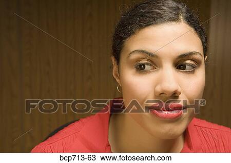 Close up of woman looking sideways View Large Photo Image Stock Image - Close up of woman looking sideways. Fotosearch