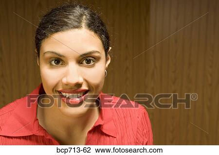 Stock Image - Close up of woman smiling. Fotosearch