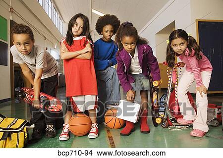 Group of students with sports equipment in hallway View Large Photo Image Picture - Group of students with sports equipment in hallway. Fotosearch