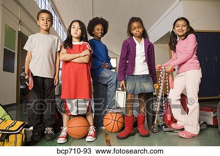 Group of students with sports equipment in hallway View Large Photo Image Stock Image - Group of students with sports equipment in hallway. Fotosearch